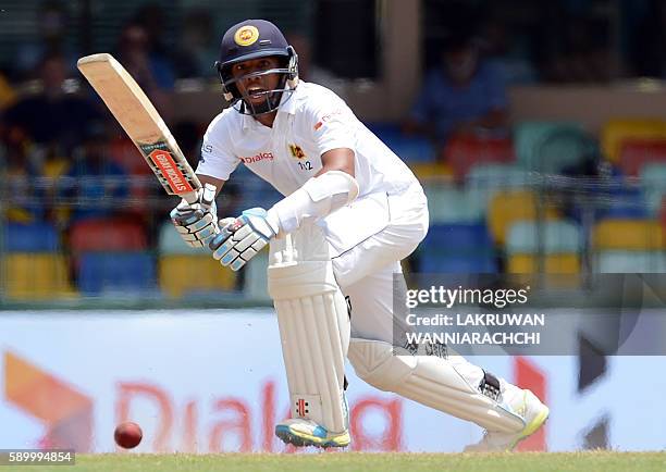 Sri Lanka's Kusal Mendis plays a shot during the fourth day of the third and final Test cricket match between Sri Lanka and Australia at The...