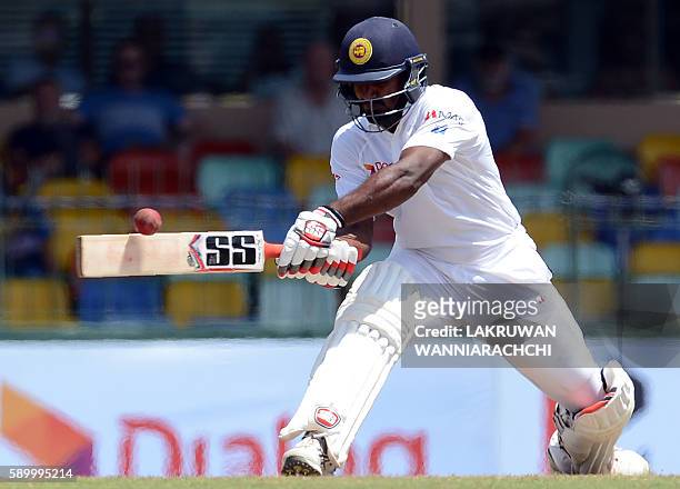 Sri Lanka's Kusal Perera plays a shot during the fourth day of the third and final Test cricket match between Sri Lanka and Australia at The...