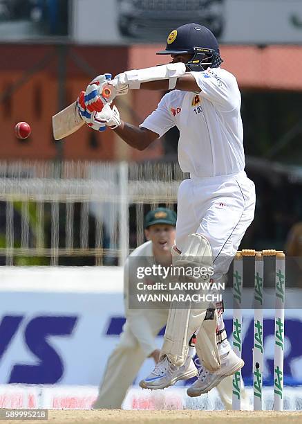 Sri Lanka's Kaushal Silva plays a shot during the fourth day of the third and final Test cricket match between Sri Lanka and Australia at The...