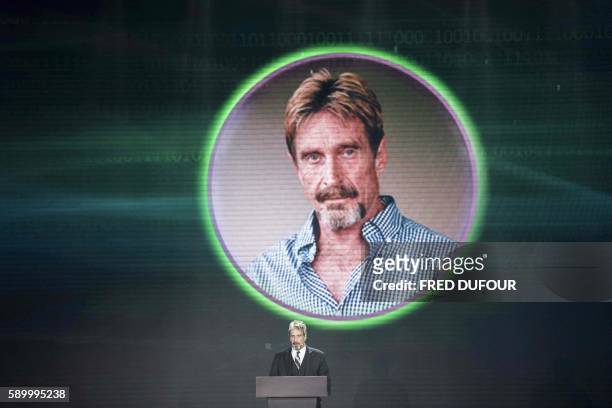 John McAfee, founder of the eponymous anti-virus company, speaks during the China Internet Security Conference in Beijing on August 16, 2016.