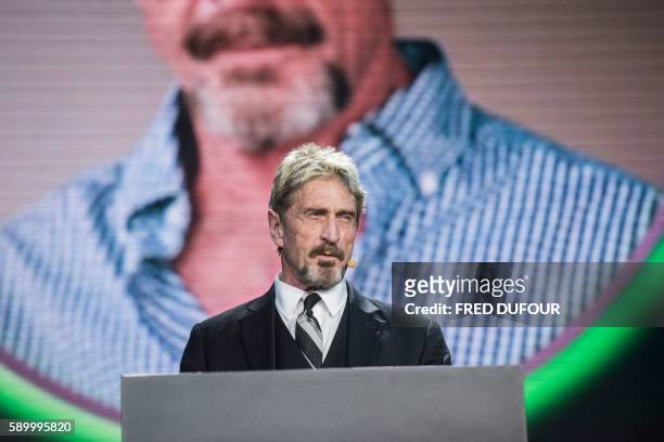 John McAfee, founder of the eponymous anti-virus company, speaks during the China Internet Security Conference in Beijing on August 16, 2016.
