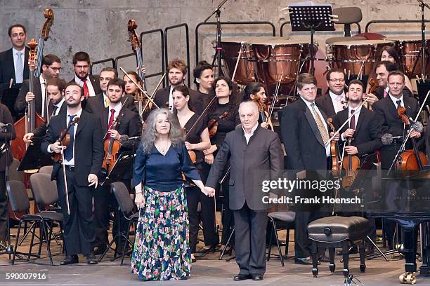 Pianist Martha Argerich, Daniel Barenboim and the West-Eastern Divan Orchestra perform live during a concert at the Waldbuehne on August 13, 2016 in...