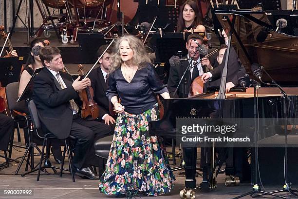 Pianist Martha Argerich and the West-Eastern Divan Orchestra perform live during a concert at the Waldbuehne on August 13, 2016 in Berlin, Germany.