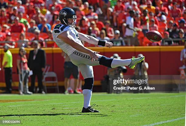 Punter Jon Ryan of the Seattle Seahawks punts the ball against the Kansas City Chiefs during the first half on August 13, 2016 at Arrowhead Stadium...