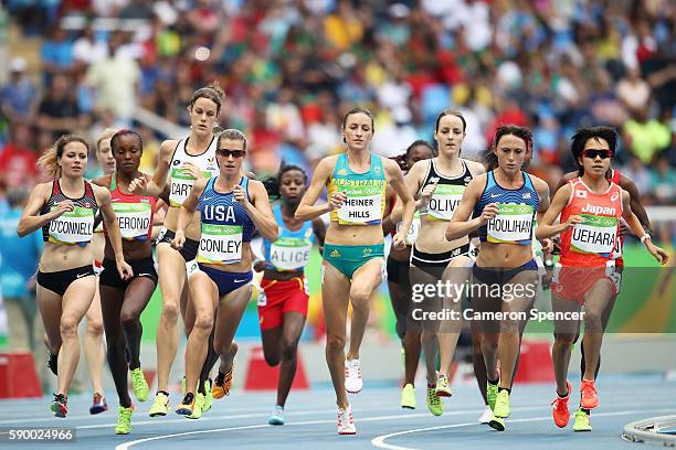 Kim Conley of the United States, Madeline Heiner Hills of Australia, Shelby Houlihan of the United States, and Miyuki Uehara of Japan lead the pack...