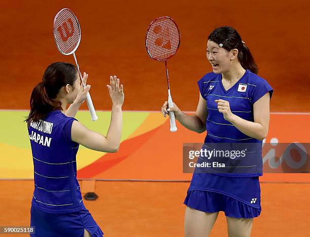 Misaki Matsutomo and Ayaka Takahashi of Japan celebrate their Doubles Semifinal match win over Kyung Eun Jung and Seung Chan of Korea on Day 11 of...