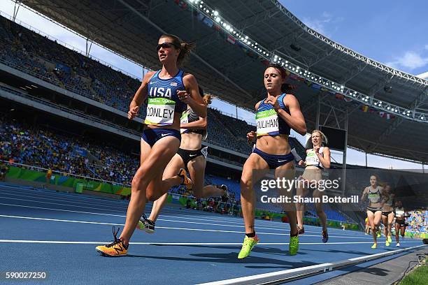 Kim Conley and Shelby Houlihan of the United States compete during the Women's 5000m Round 1 - Heat 1 on Day 11 of the Rio 2016 Olympic Games at the...