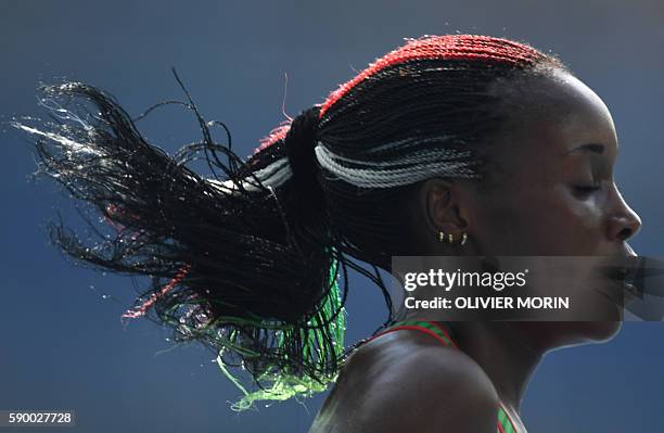 Kenya's Mercy Cherono competes in the Women's 5000m Round 1 during the athletics event at the Rio 2016 Olympic Games at the Olympic Stadium in Rio de...