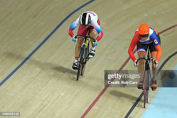 Elis Ligtlee of the Netherlands competes against Anastasiia Voinova of Russia during a Women's Sprint Quarterfinal race on Day 11 of the Rio 2016...