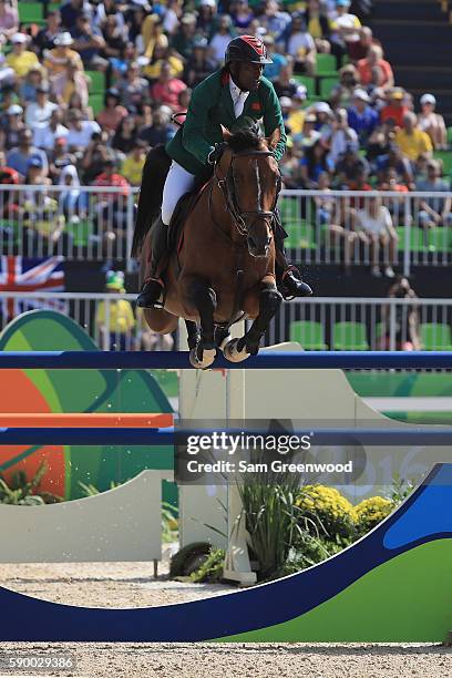 Abdelkebir Ouaddar of Morocco rides Quickly De Kreisker during the Individual Jumping on Day 11 of the Rio 2016 Olympic Games at the Olympic...