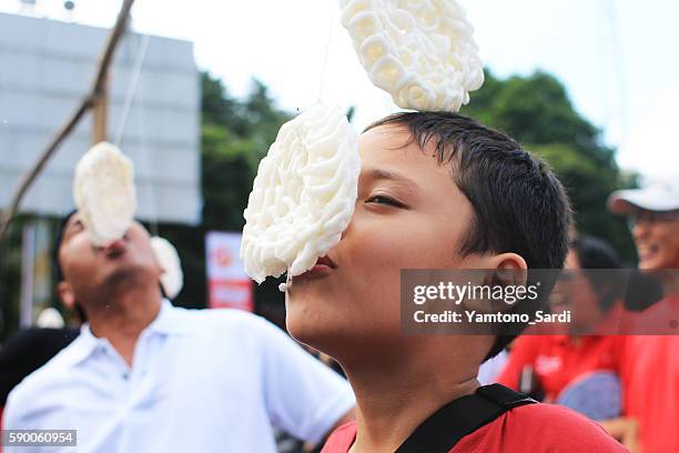 cracker eating contest - sky crackers stock pictures, royalty-free photos & images