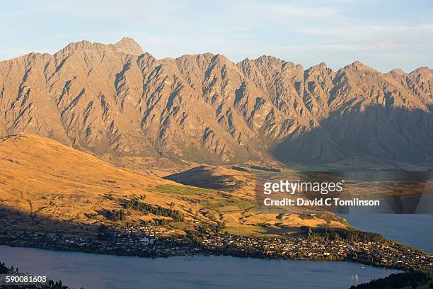 view to the remarkables at sunset, queenstown - queenstown stock pictures, royalty-free photos & images