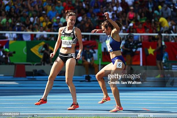 Abbey D'Agostino of the United States and Nikki Hamblin of New Zealand react after a collision during the Women's 5000m Round 1 - Heat 2 on Day 11 of...