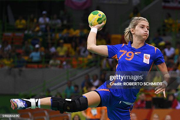 Netherlands' left back Estavana Polman shoots during the women's quarterfinal handball match Brazil vs Netherlands for the Rio 2016 Olympics Games at...