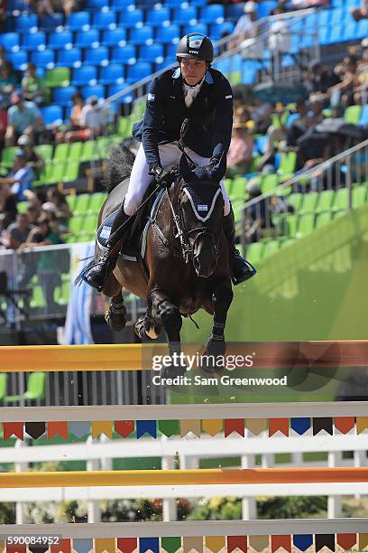 Bruno Passaro of Argentina rides Chicago Z during the Team Jumping on Day 11 of the Rio 2016 Olympic Games at the Olympic Equestrian Centre on August...