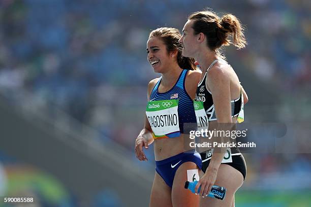 Abbey D'Agostino of the United States talks with Nikki Hamblin of New Zealand after the Women's 5000m Round 1 - Heat 2 on Day 11 of the Rio 2016...