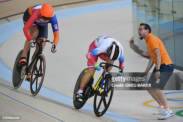 Netherlands' Elis Ligtlee races Russia's Anastasiia Voinova during the Women's sprint quarter-finals track cycling event at the Velodrome during the...