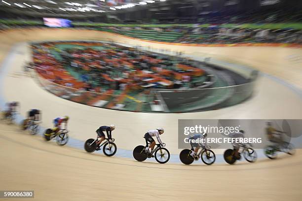 Cyclists race during heat 4 of the Men's Keirin qualifying track cycling event at the Velodrome during the Rio 2016 Olympic Games in Rio de Janeiro...