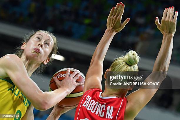 Serbia's point guard Milica Dabovic defends against Australia's forward Natalie Burton during a Women's quarterfinal basketball match between...