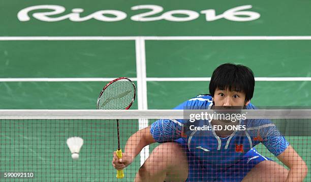 China's Tang Yuanting and China's Yu Yang return against Denmark's Christinna Pedersen and Denmark's Kamilla Rytter Juhl during their women's doubles...