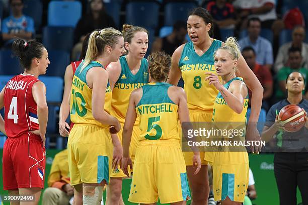 Serbia's point guard Tamara Radocaj, Australia's small forward Rachel Jarry, Australia's forward Natalie Burton, Australia's point guard Leilani...