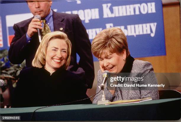 First Lady Hillary Clinton and Mrs. Naina Yeltsin, wife of the Russian President Boris Yeltsin , laugh at a town hall meeting sponsored by the Urals...