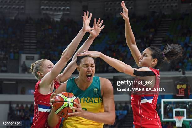 Serbia's power forward Danielle Page and Serbia's forward Sonja Petrovic defends against Australia's centre Elizabeth Cambage during a Women's...