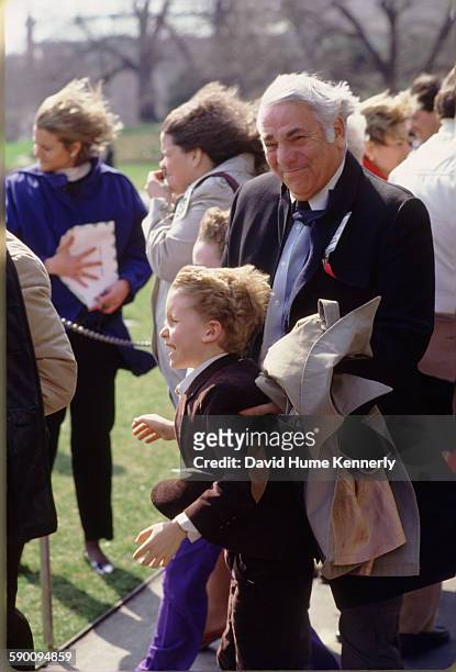 Photographer David Hume Kennerly's father, O.A. Kennerly , watching President Ronald Reagan's helicopter take off at the White House south lawn, with...