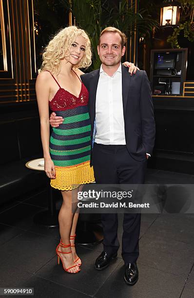 Pixie Lott and brother Stephen Lott poses at the launch of her limited edition track "A Real Good Thing" with Select Model Management at Tramp on...