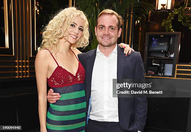 Pixie Lott and brother Stephen Lott poses at the launch of her limited edition track "A Real Good Thing" with Select Model Management at Tramp on...