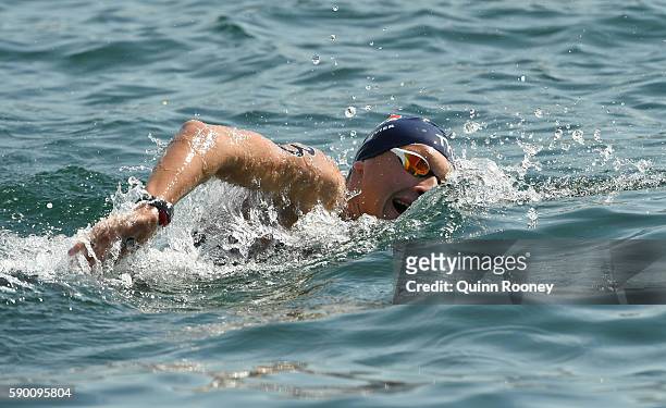 Marc-Antoine Olivier of France competes in the Men's 10km Marathon Swim on Day 11 of the Rio 2016 Olympic Games at Fort Copacabana on August 16, 2016...