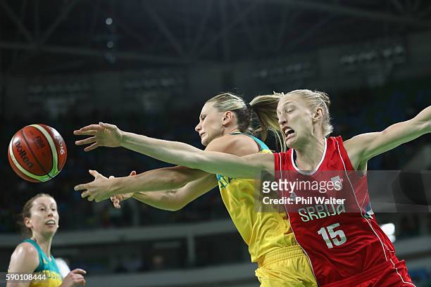 Penny Taylor of Australia and Danielle Page of Serbia contest the ball during the Women's Quarterfinal match between Australia and Serbia at the...