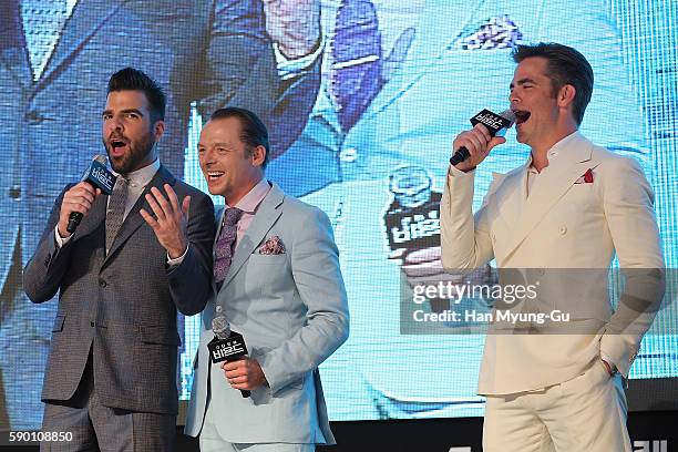 Actors Simon Pegg, Chris Pine and Zachary Quinto attend the Fan Screening of the Paramount Pictures title "Star Trek Beyond" on August 16, 2016 at...