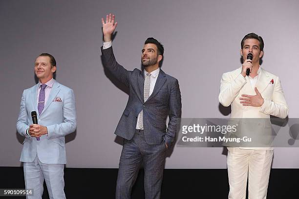 Actors Simon Pegg, Chris Pine and Zachary Quinto attend the Fan Screening of the Paramount Pictures title "Star Trek Beyond" on August 16, 2016 at...