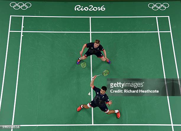 Marcus Ellis and Chris Langridge of Great Britain in action against Fu Haifeng and Zhang Nan of China in the Badminton Men's Doubles Semi-Final at...