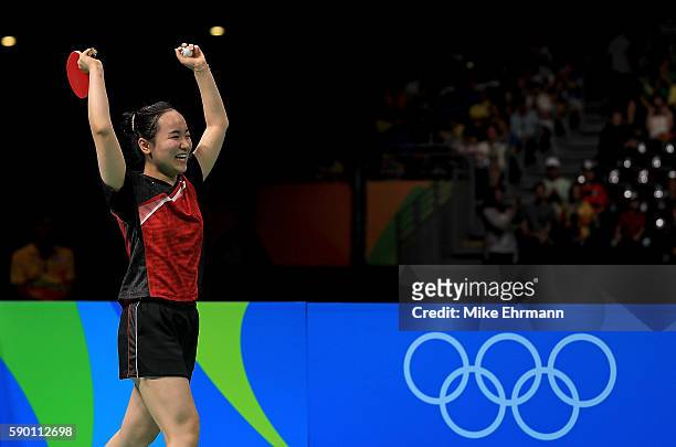 Mima Ito of Japan celebrates winning the Womens Team Bronze Medal match on Day 11 of the Rio 2016 Olympic Games at the Riocentro - Pavilion 3 on...
