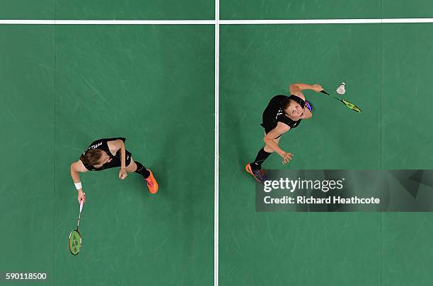 Christinna Pedersen and Kamilla Rytter Juhl of Denamrk in action against Tang Yuanting and Yu Yang of China in the Badminton Women's Doubles...