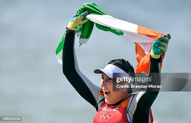 Rio , Brazil - 16 August 2016; Annalise Murphy of Ireland celebrates winning silver in the Women's Laser Radial Medal race on the Pão de Açúcar...