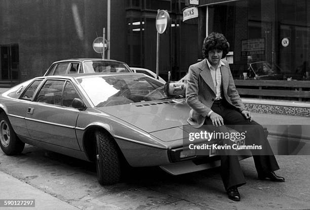 Businessman Tony Davidson, owner of TJ Davidson's rehearsal room and TJM Records, poses with guitarist Gus 'Gangrene' Callendar of punk band The...