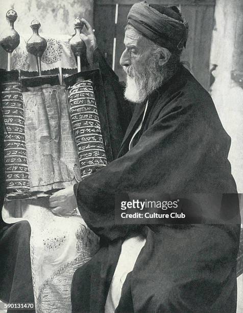 Samaritan priest from Nablus communitywith scrolls of the Law in hard case
