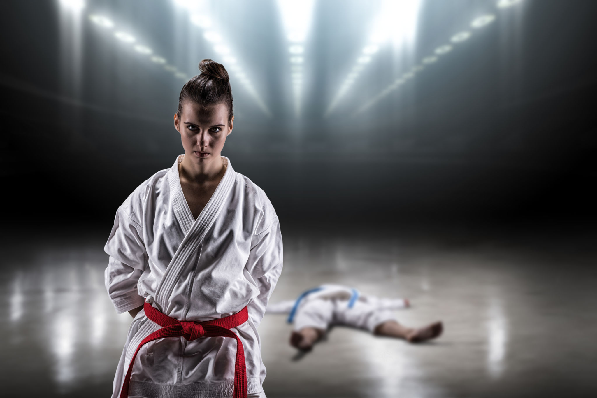 Sexy girl in a kimono karate rejoices victory Sexy girl in a kimono karate rejoices victory