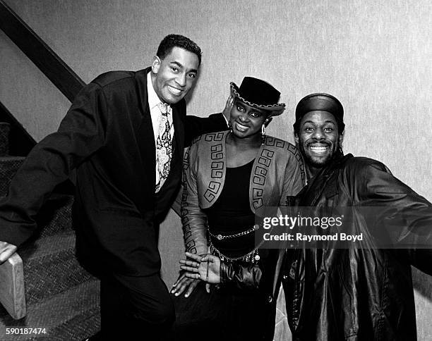 Musician Steve Nichol, and singers Jane Eugene and Carl McIntosh of Loose Ends poses for photos backstage at the Holiday Star Theatre in...