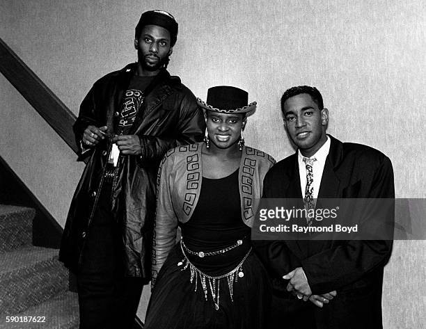 Singers Carl McIntosh and Jane Eugene, and musician Steve Nichol of Loose Ends poses for photos backstage at the Holiday Star Theatre in...