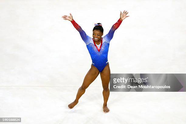 Simone Biles of the United States reacts after competing on the Women's Floor final on Day 11 of the Rio 2016 Olympic Games at the Rio Olympic Arena...