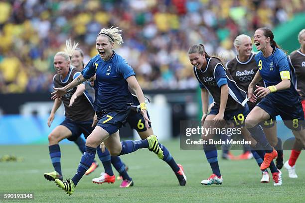 Lisa Dahlkvist of Sweden and her teammates celebrate victory in the Women's Football Semi Final between Brazil and Sweden on Day 11 of the Rio 2016...