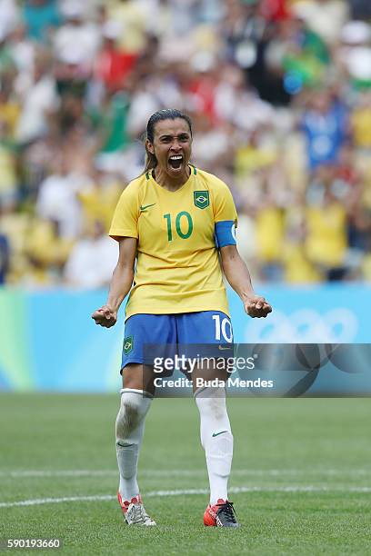 Marta of Brazil celebrates a penalty during the Women's Football Semi Final between Brazil and Sweden on Day 11 of the Rio 2016 Olympic Games at...