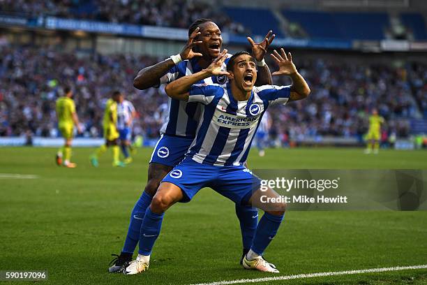 Anthony Knockaert of Brighton and Hove Albion celebrates with team mate, Gaetan Bong of Brighton and Hove Albion after scoring his sides first goal...