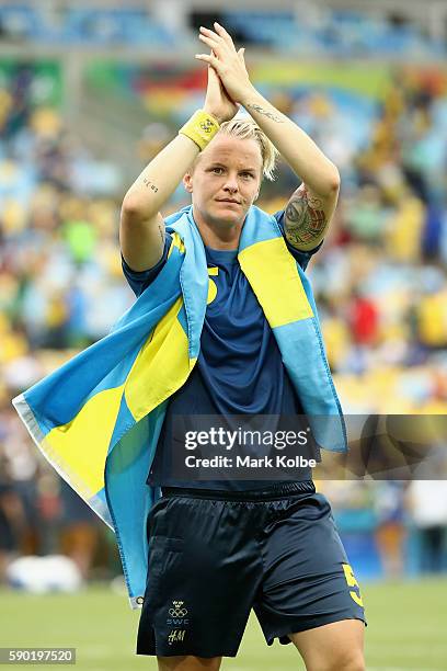 Nilla Fischer of Sweden celebrates victory in the Women's Football Semi Final between Brazil and Sweden on Day 11 of the Rio 2016 Olympic Games at...