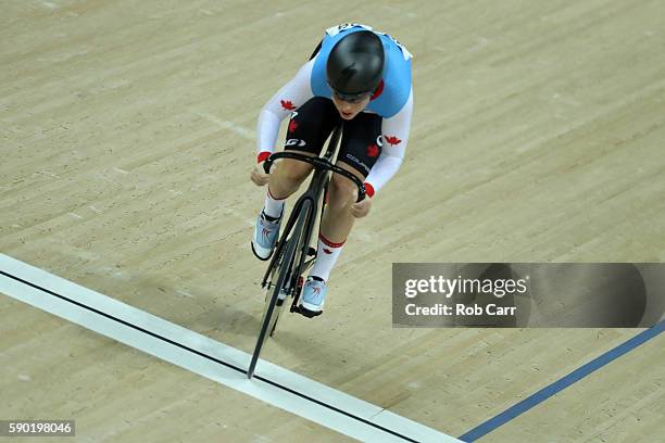 Allison Beveridge of Canada competes during the Women's Omnium Flying Lap 5\6 race on Day 11 of the Rio 2016 Olympic Games at the Rio Olympic...