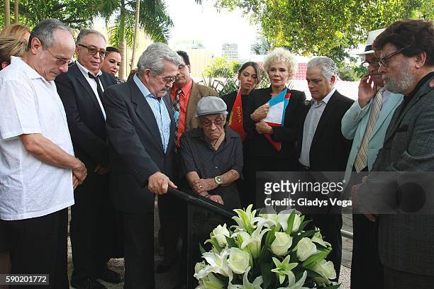 Group of artists participate in a Memorial Act as part of Elin Ortiz Burial. TV pioneer Elin Ortiz is laid to rest at WAPA TV on August 16, 2016 in...
